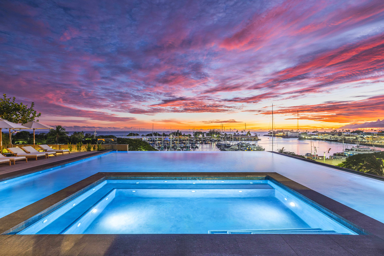 Victoria Place condo pool at sunset.