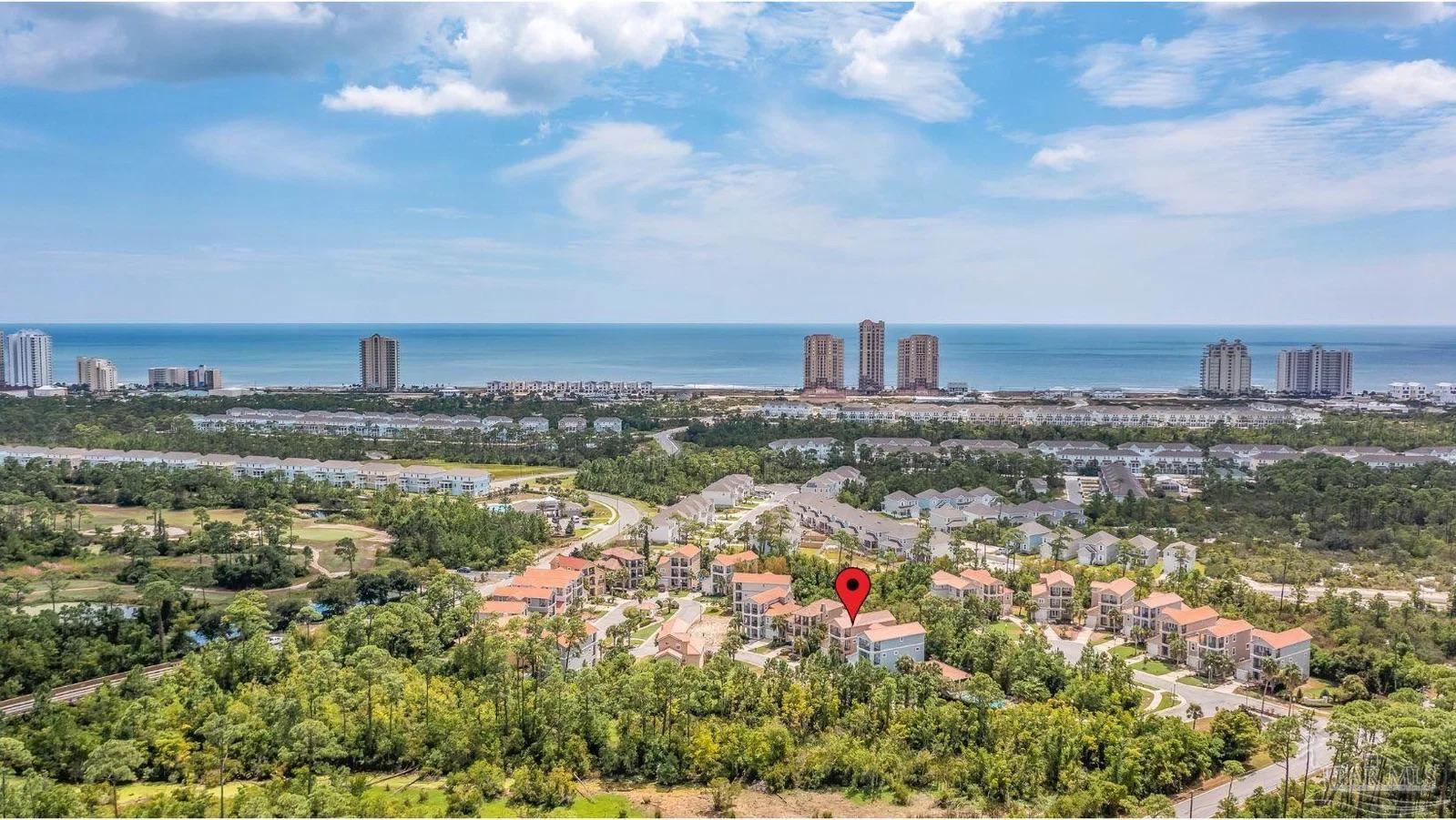 Aerial view highlighting 13987 Hanging Branch Way in Arborgate at Perdido Key, with the Gulf in the distance
