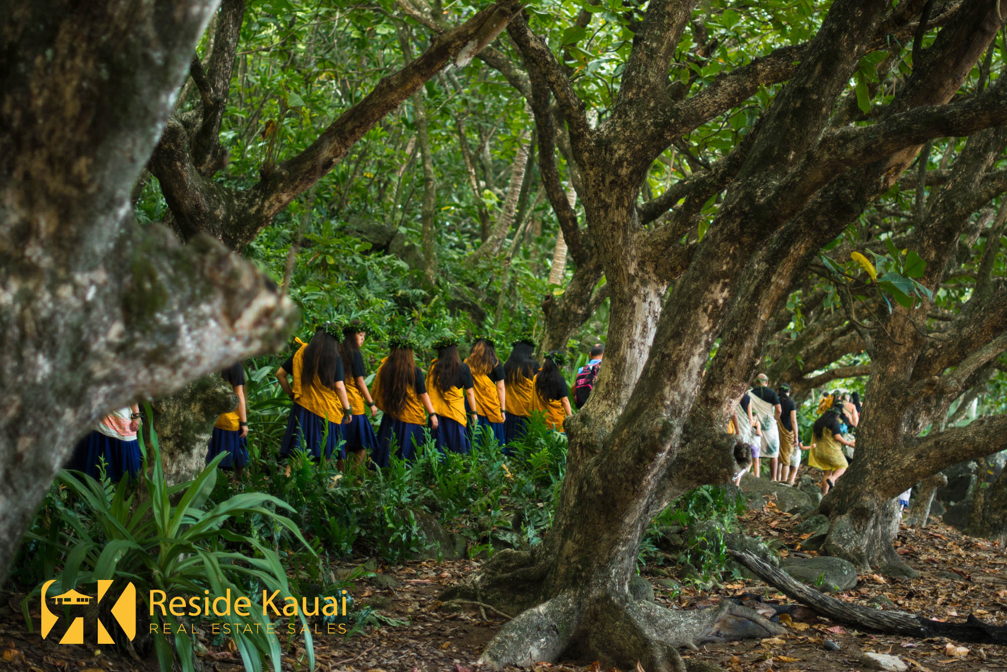 This is a photo of a group of Hula Practitioners on theeir way up to two ancient Hula Heiau's above Ke'e Breach.