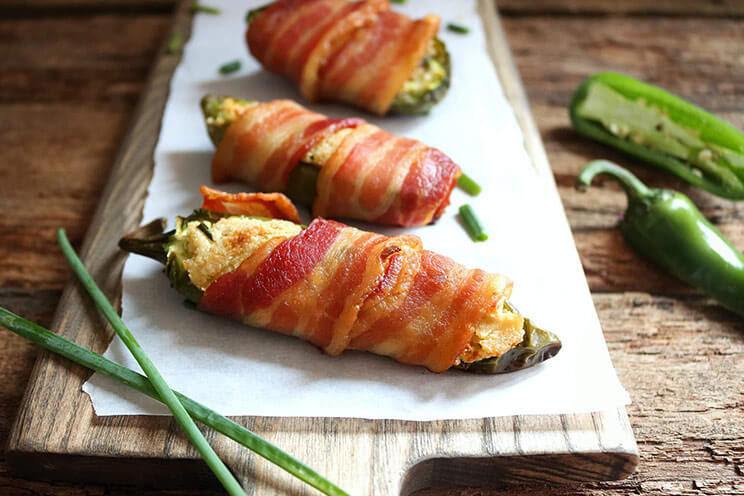 Jalapeno poppers wrapped in bacon for superbowl snacks