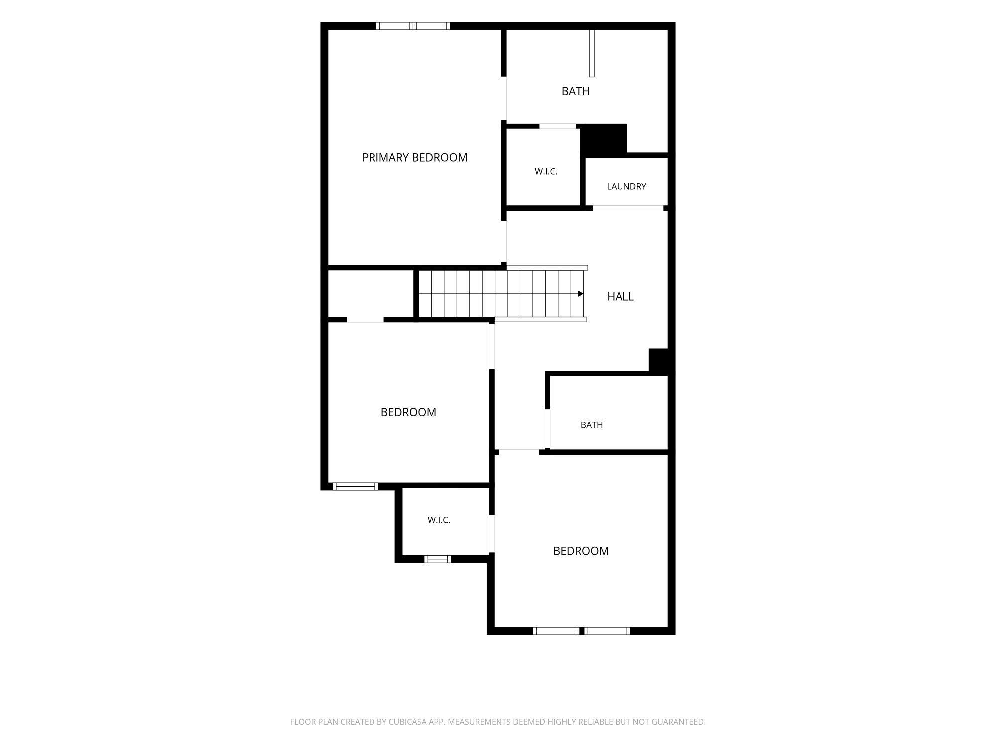 Black-and-white second-floor floor plan of a two-story home featuring three bedrooms, two full bathrooms, a centrally located hallway, dedicated laundry room, and multiple walk-in closets. The upper level includes a spacious primary bedroom with an en-suite bathroom and walk-in closet, plus two additional bedrooms that share a full bathroom. This detailed residential floor plan highlights the efficient layout, private bedroom arrangement, and convenient second-floor laundry.