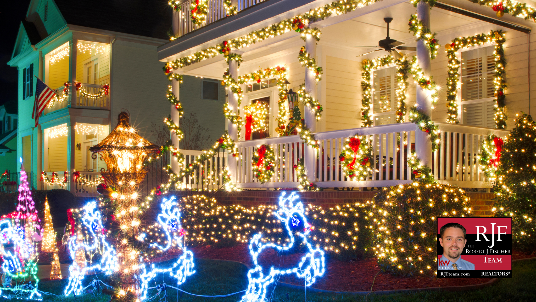 A photo of a house decorated for Christmas with the Robert J Fischer Team logo in the bottom right corner