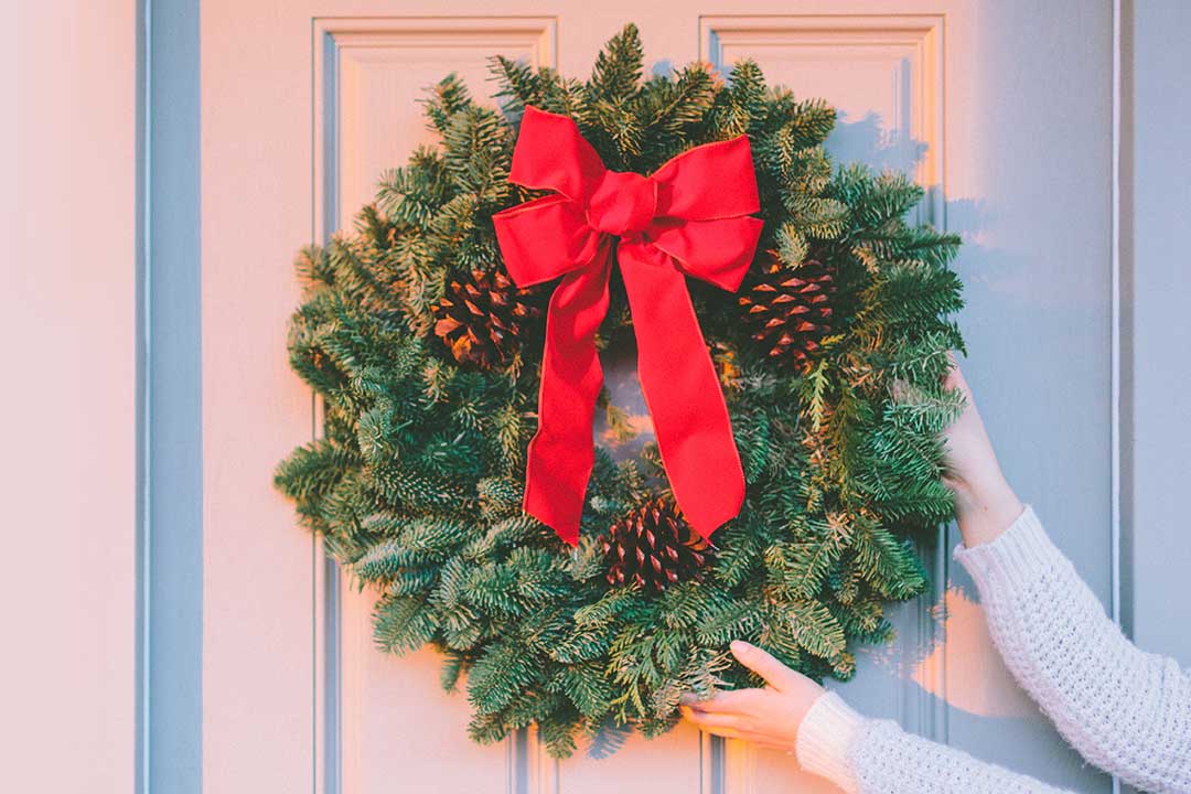 PIC - CHRISTMAS WREATH ON THE DOOR: With Less Inventory, Let your Home Stand Out to Interested Buyers with Winter Holiday Decor.