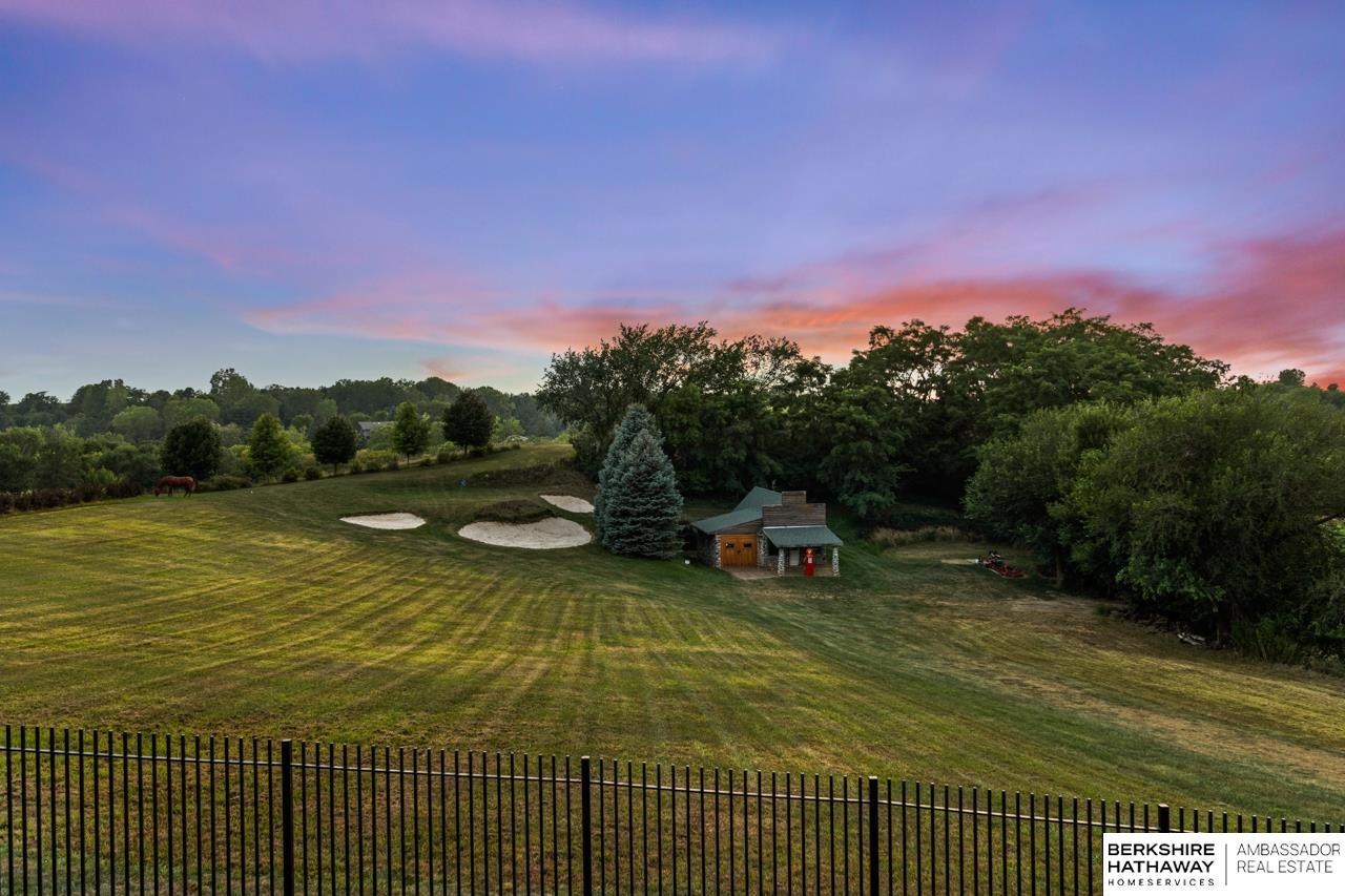 Backyard golfing area with scenic views
