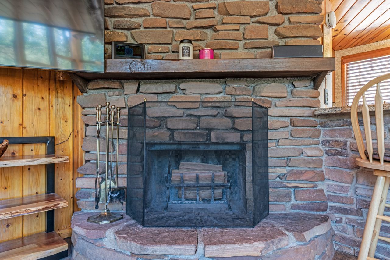 Pine ceiling and tall windows in the Payson home living room