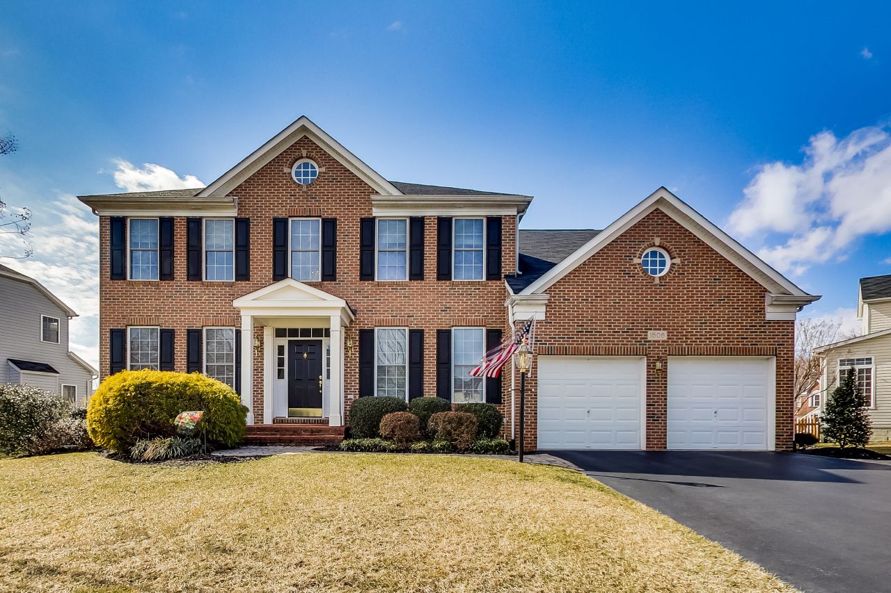Large brick-front Colonial home