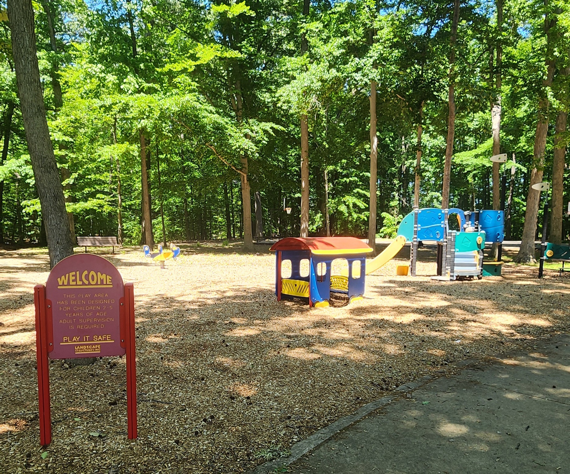 Shaded playground area at Foxhill Park in Bowie MD near Belair at Bowie