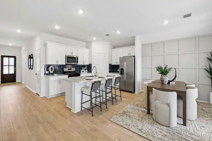 Bright kitchen and dining area in a new home