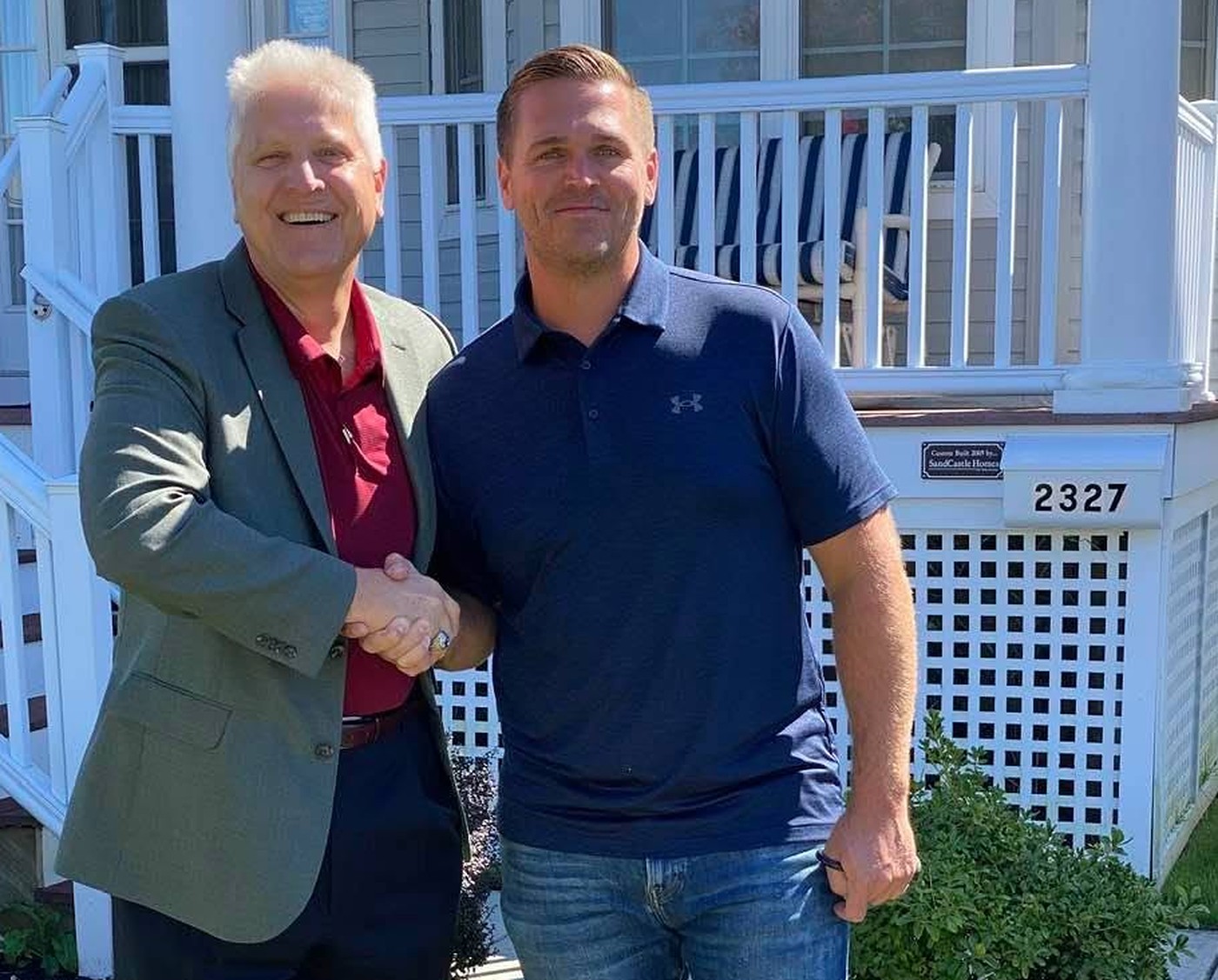 Jim Murray with a happy client after a successful closing