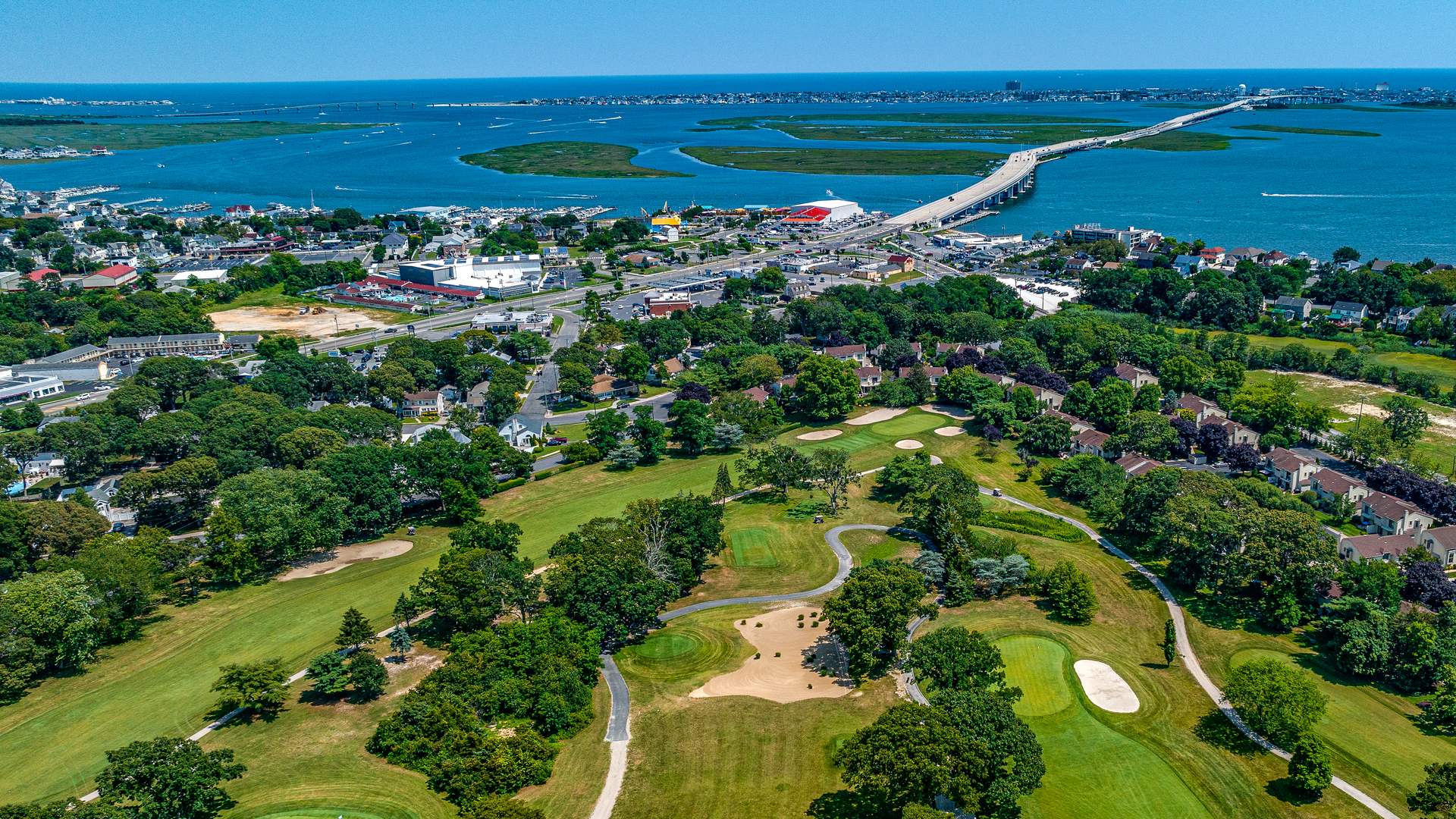 Somers Point, NJ golf course, bay and the bridge to Ocean City from above