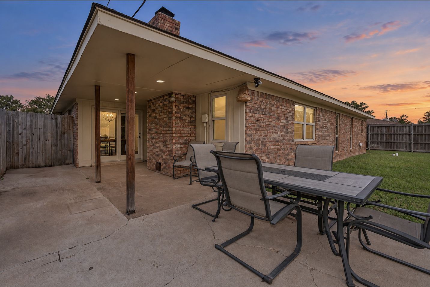 Covered back patio at twilight at 3309 Burrus Place Amarillo TX