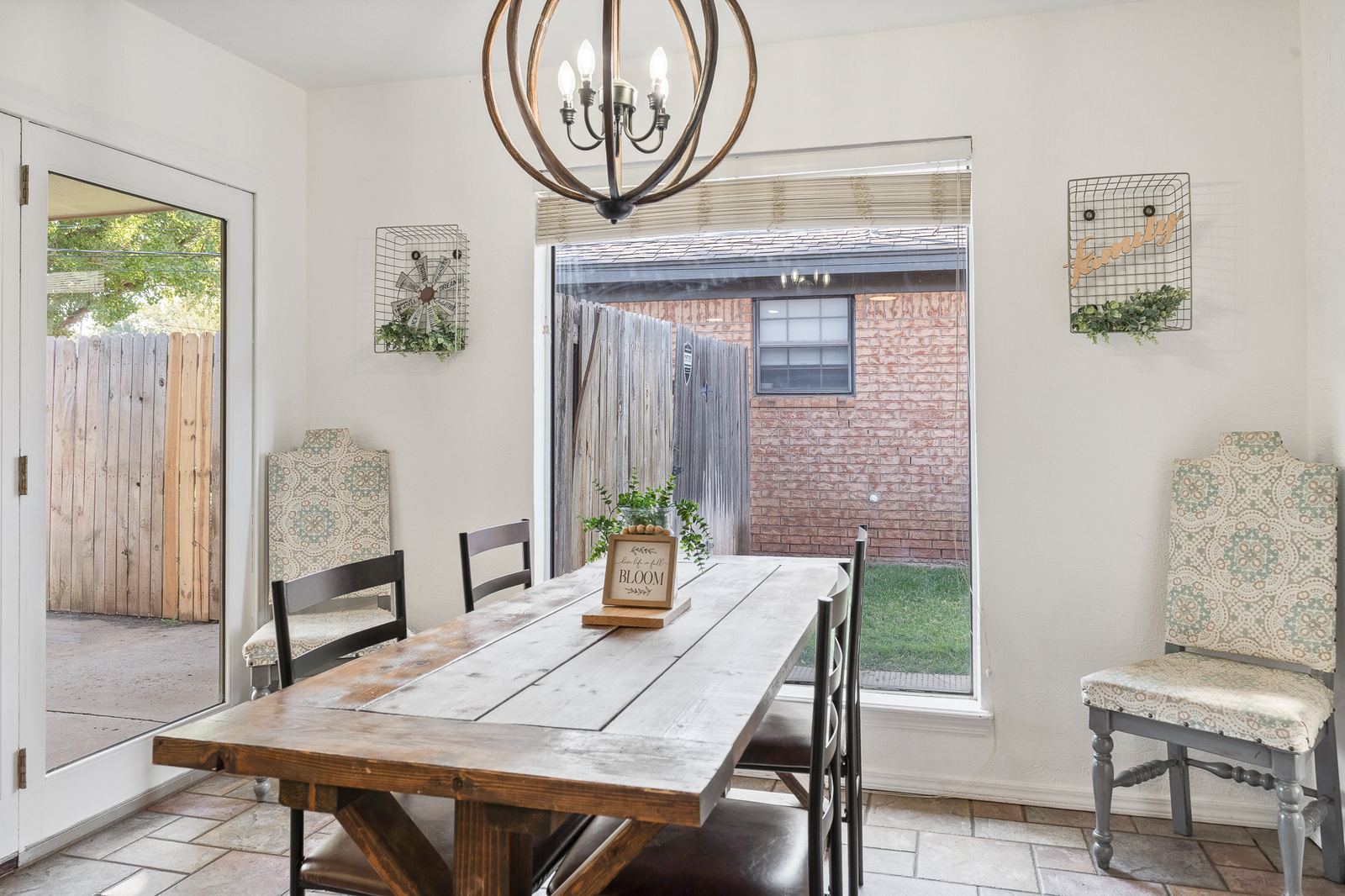 Dining area with chandelier and window at 3309 Burrus Place Amarillo TX