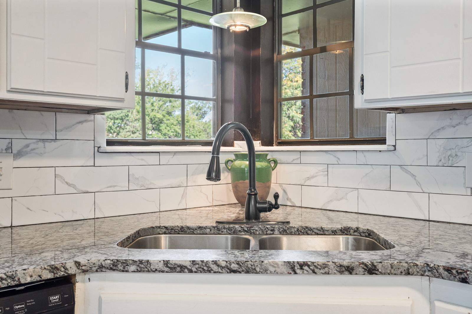 Kitchen with granite countertops and window over the sink at 3309 Burrus Place Amarillo TX