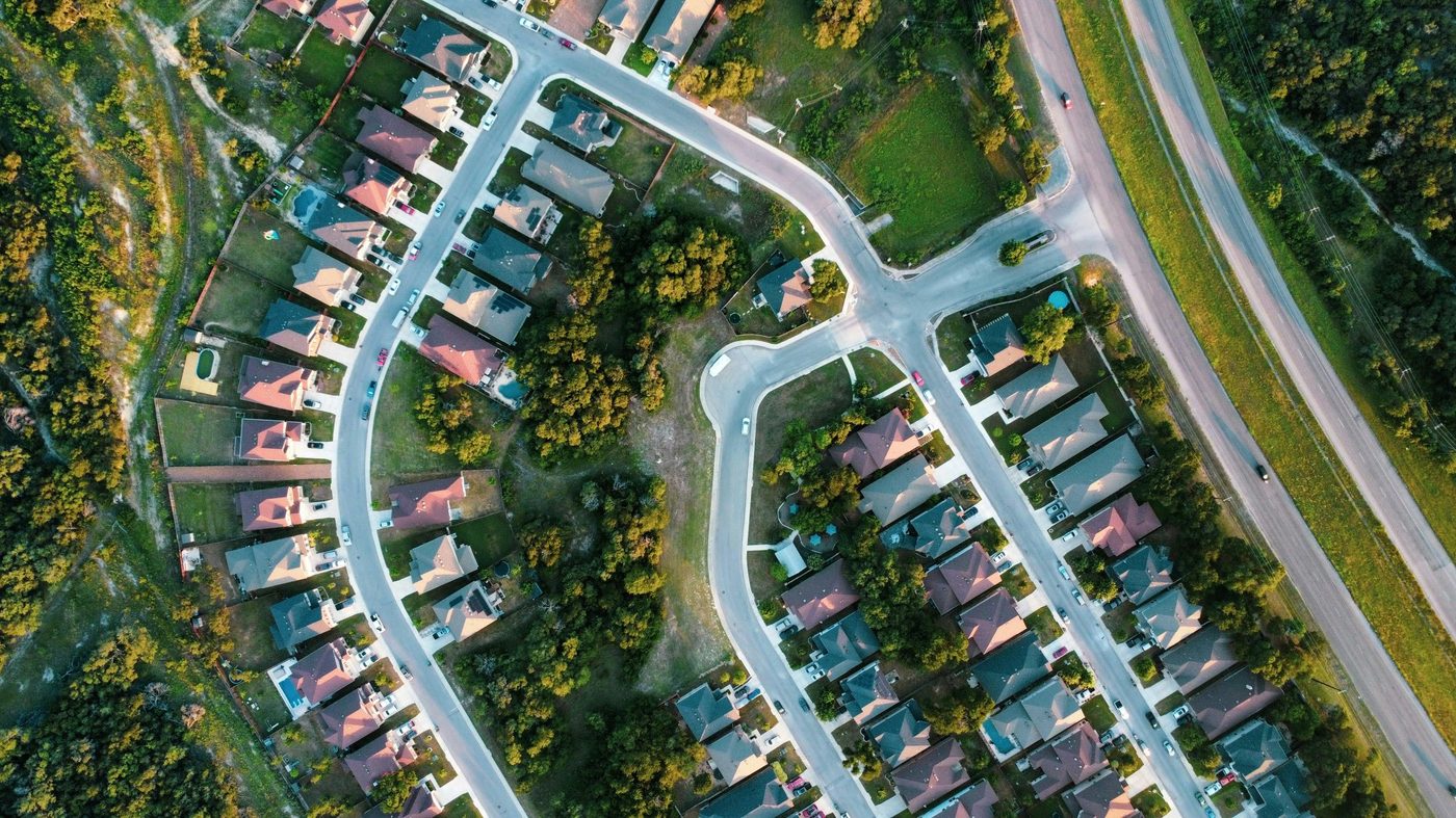 Aerial drone view of a U.S. suburban neighborhood ,  top real estate websites ranked and reviewed