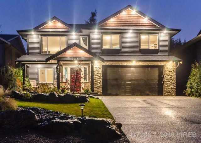 Nanaimo Home at Night with Exterior Lighting
