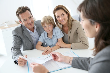 Family meeting real estate agent to buy a new home