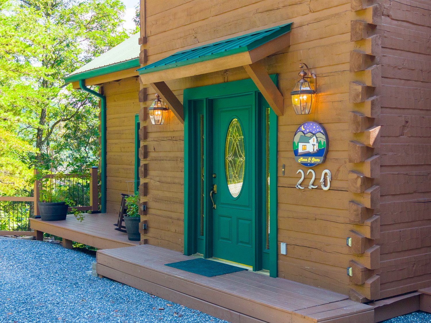 Front entry with a green oval-glass door