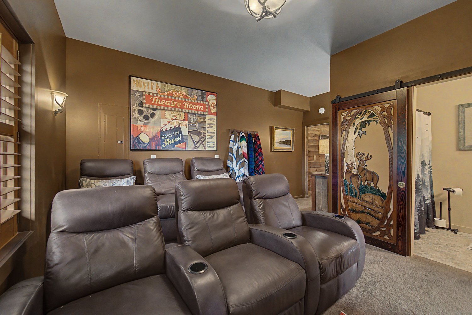 Lower level theater room with recliners