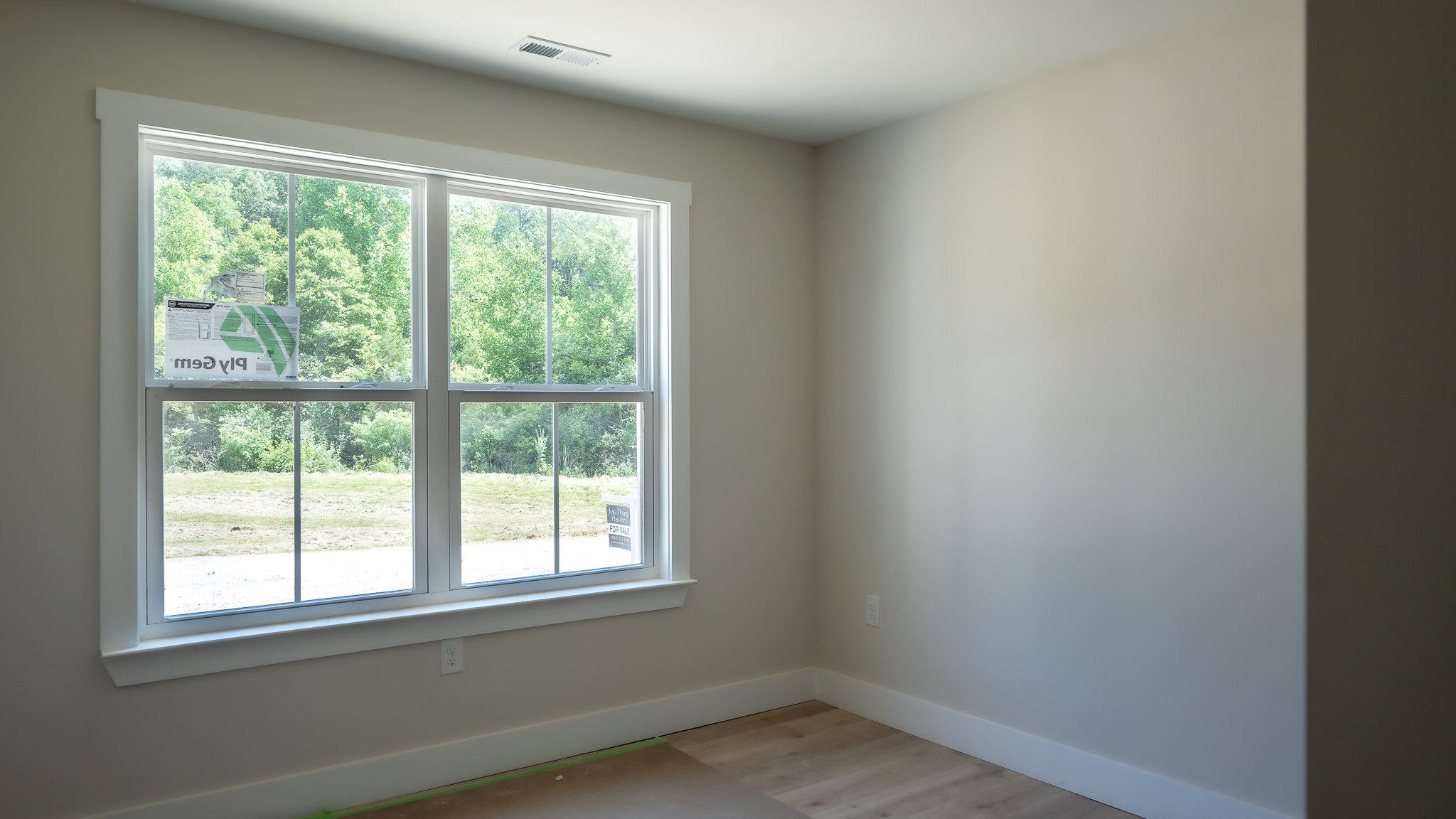 Same Charlotte plan at 40 Meadow Ridge Road: bedroom with a double window