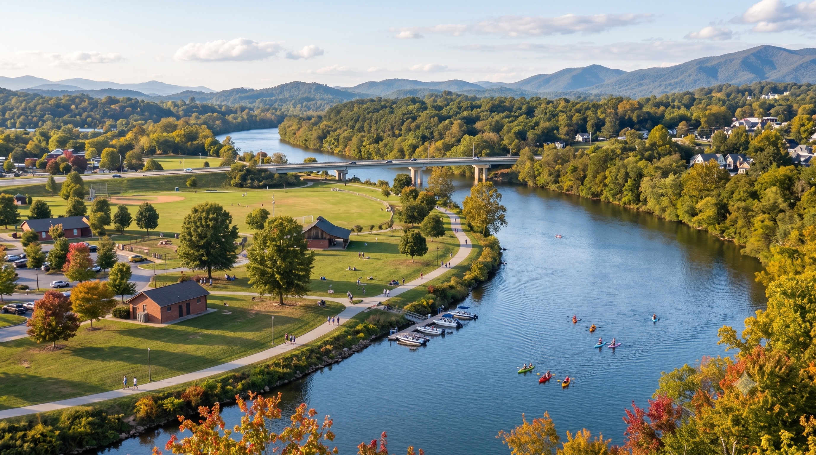 Calm bend of the French Broad River winding through green forested hills near Rosman in Transylvania County, North Carolina.