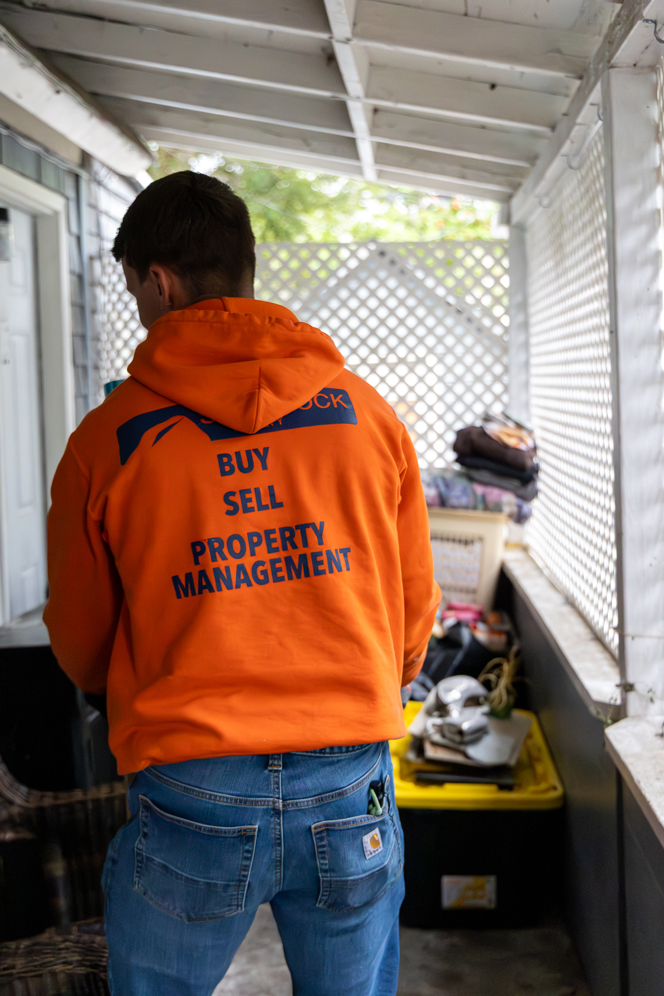 Eviction team member on porch