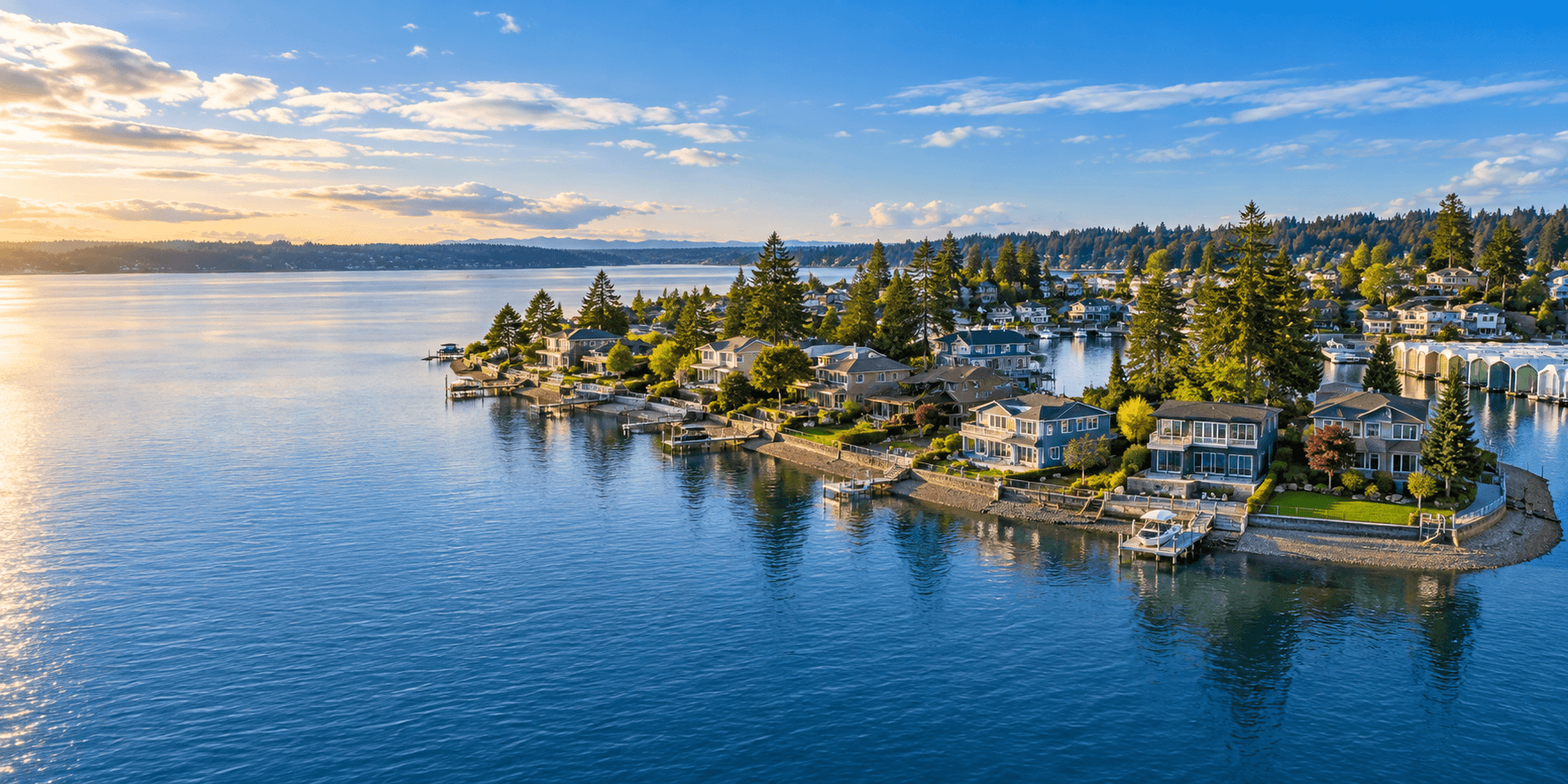 Day Island, University Place, WA &mdash; waterfront homes on the Tacoma Narrows with the Olympic Mountains beyond