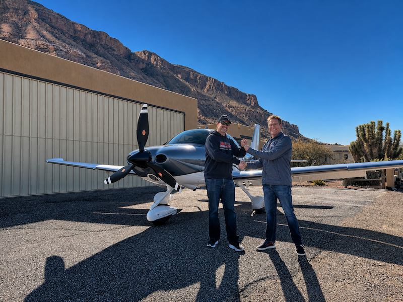 Lance Clifford handing over keys to clients at Grassy Meadows Sky Ranch airpark in Hurricane Utah