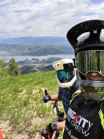 Lance and Connor riding the Deer Valley lift with mountain bikes