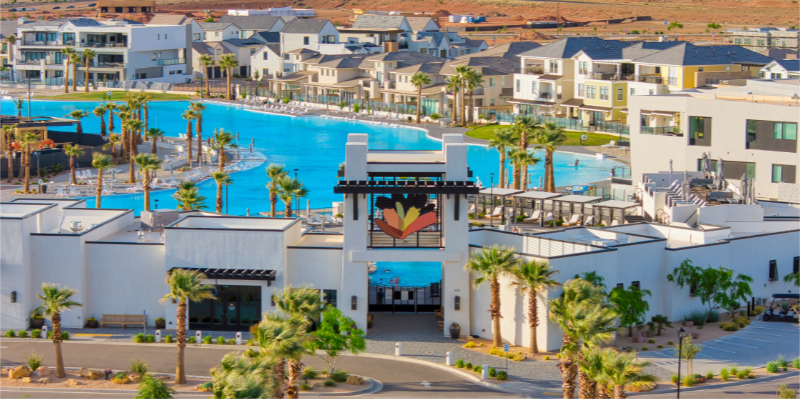 Desert Color lagoon in St. George Utah with beach, swimmers, and paddleboards