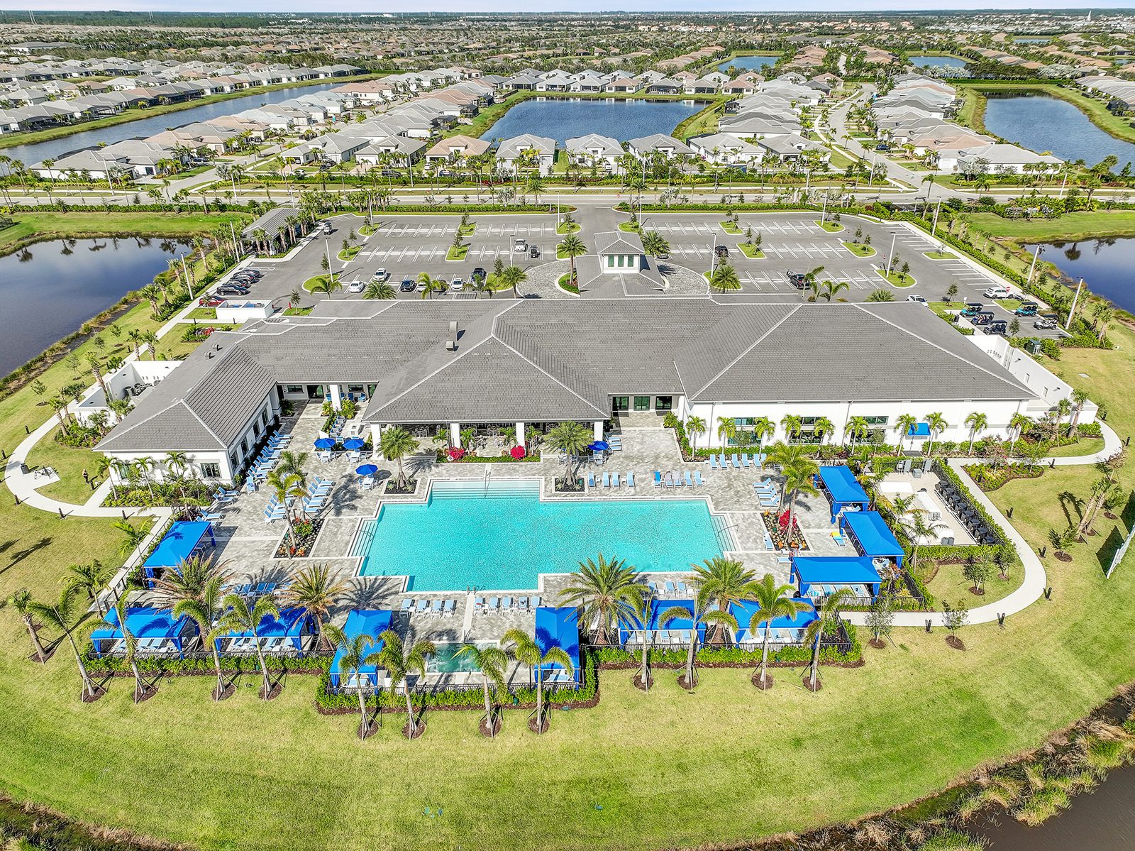 Aerial view of the clubhouse and resort-style pool in Riverland Port St. Lucie