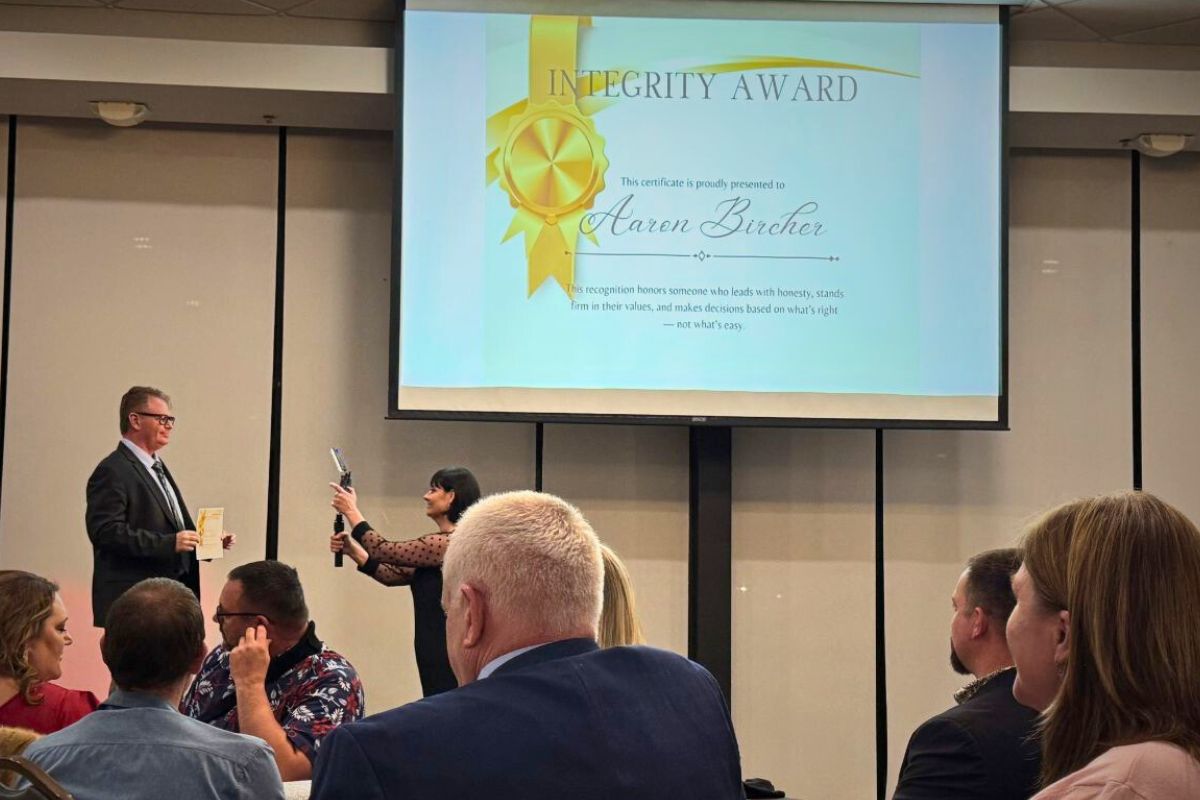 Aaron Bircher receiving the 2025 Integrity Award.
