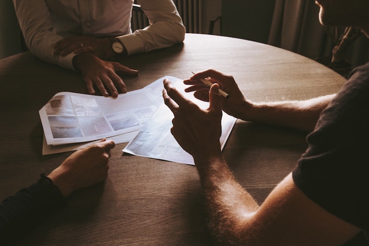 People meeting at a table.