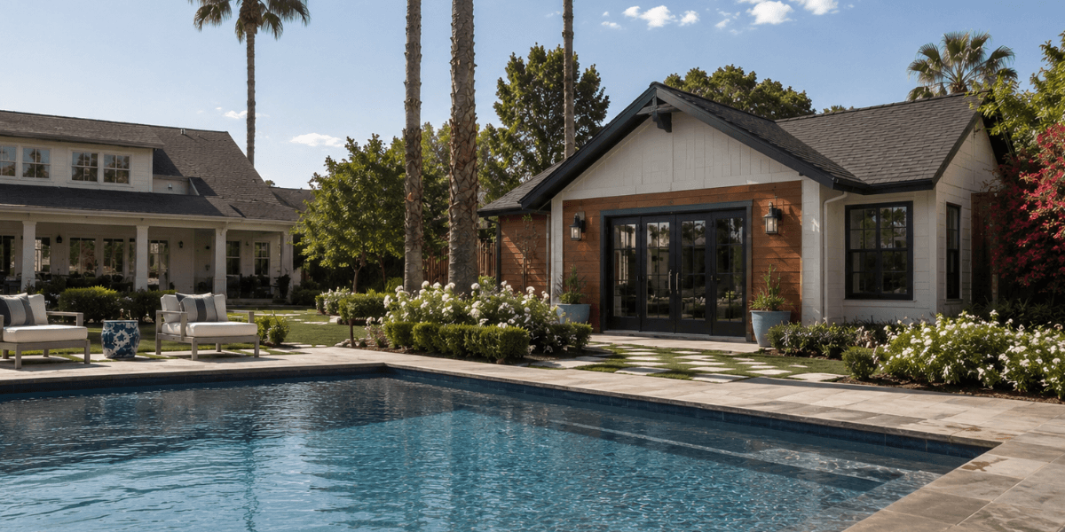 luxury scottsdale home for sale with a guest house and a pool with beautiful landscaping