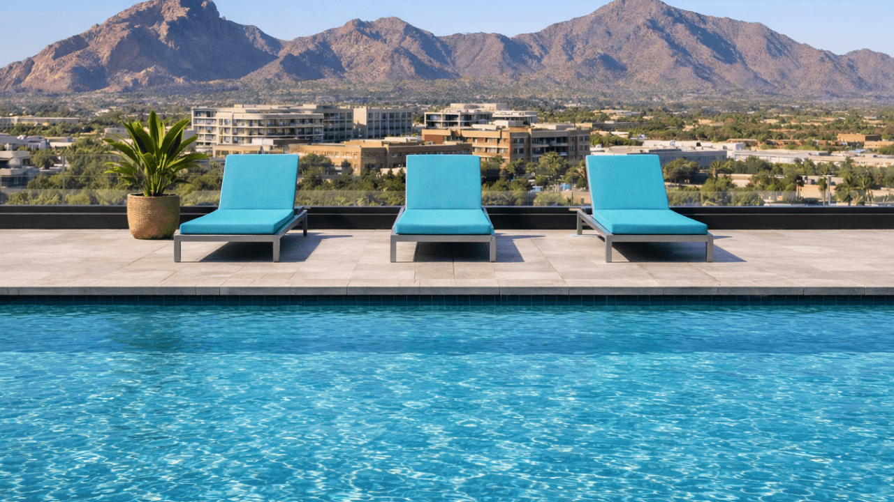 Rooftop pool at Optima Kierland in Scottsdale with city views and nearby mountains