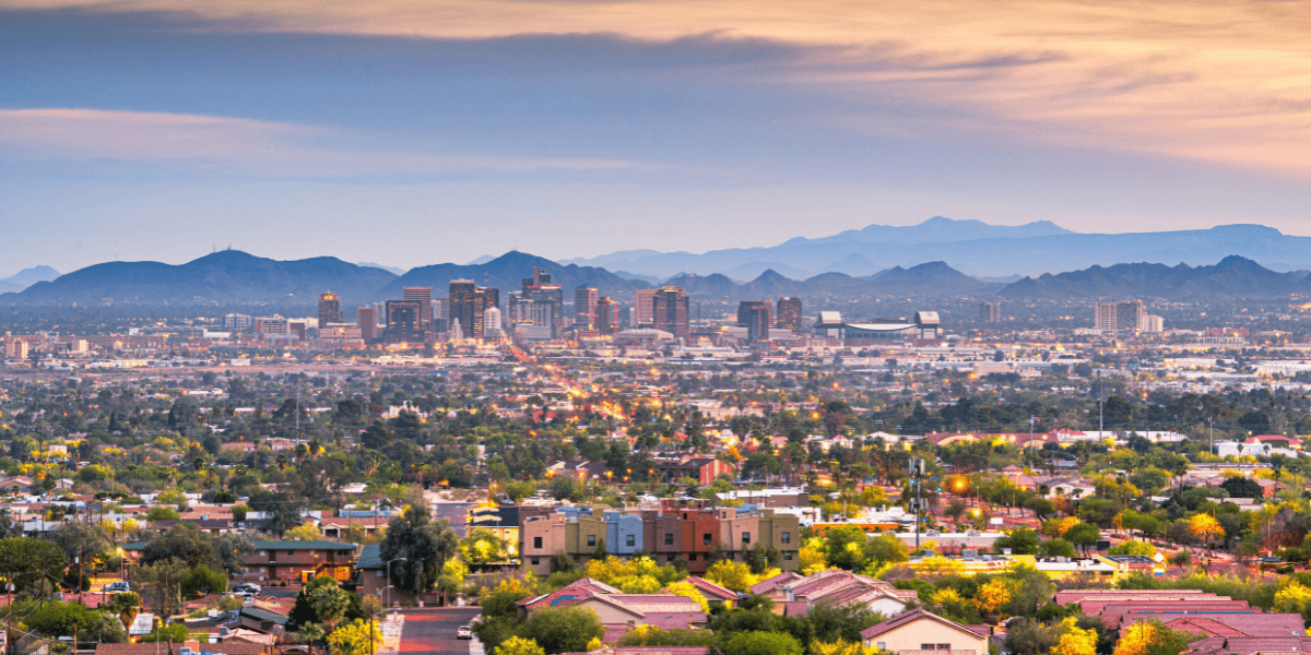 Aerial view of Phoenix Arizona showing city skyline and surrounding neighborhoods across the Valley