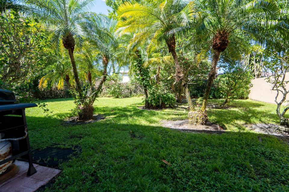 Backyard space ideal for families and pets in Cocoplum Lake Worth Florida