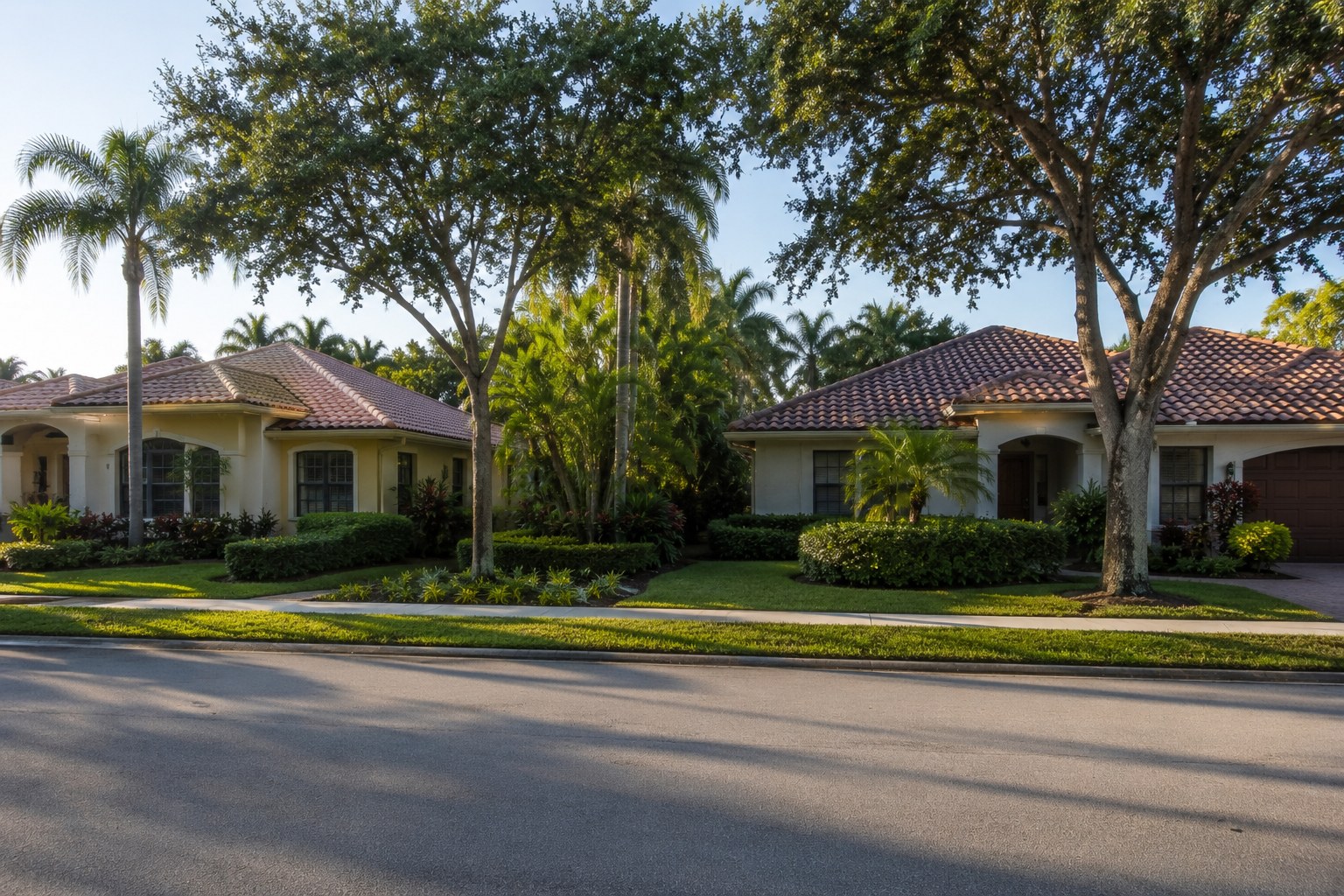 Two established Palm Beach County homes in one frame, supporting a blog on the five ways to sequence a sale and a purchase and what each trades away.