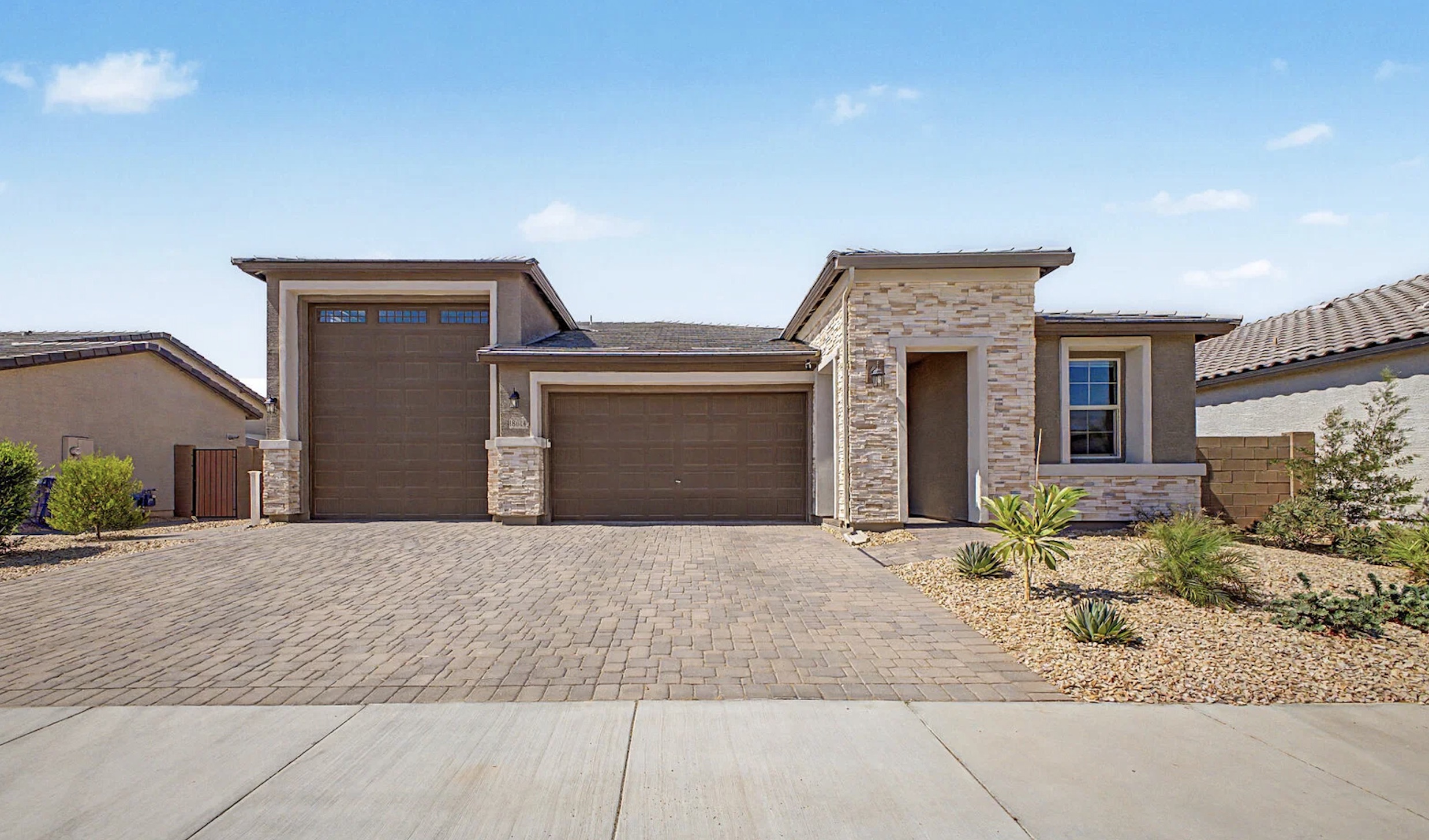 Single-story Rio Rancho Estates home with attached RV garage in Surprise Arizona
