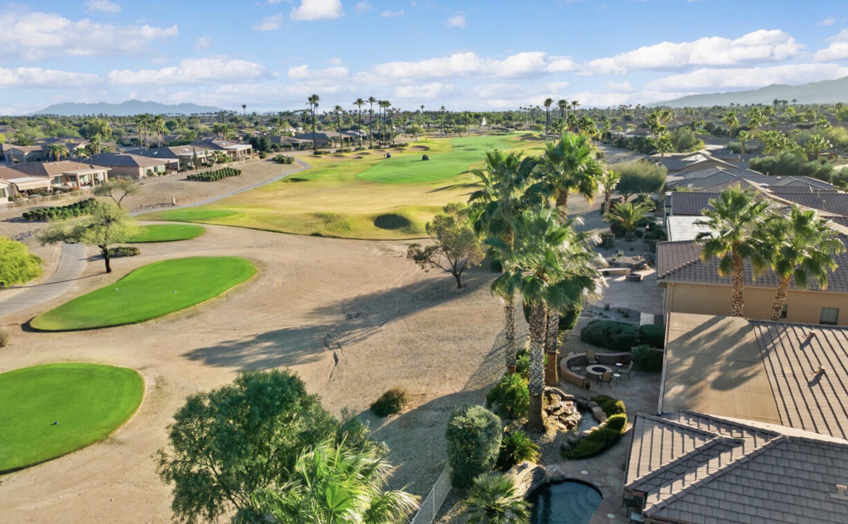 Golf-course homes, desert landscaping and mountain views in The Grand, Surprise, Arizona