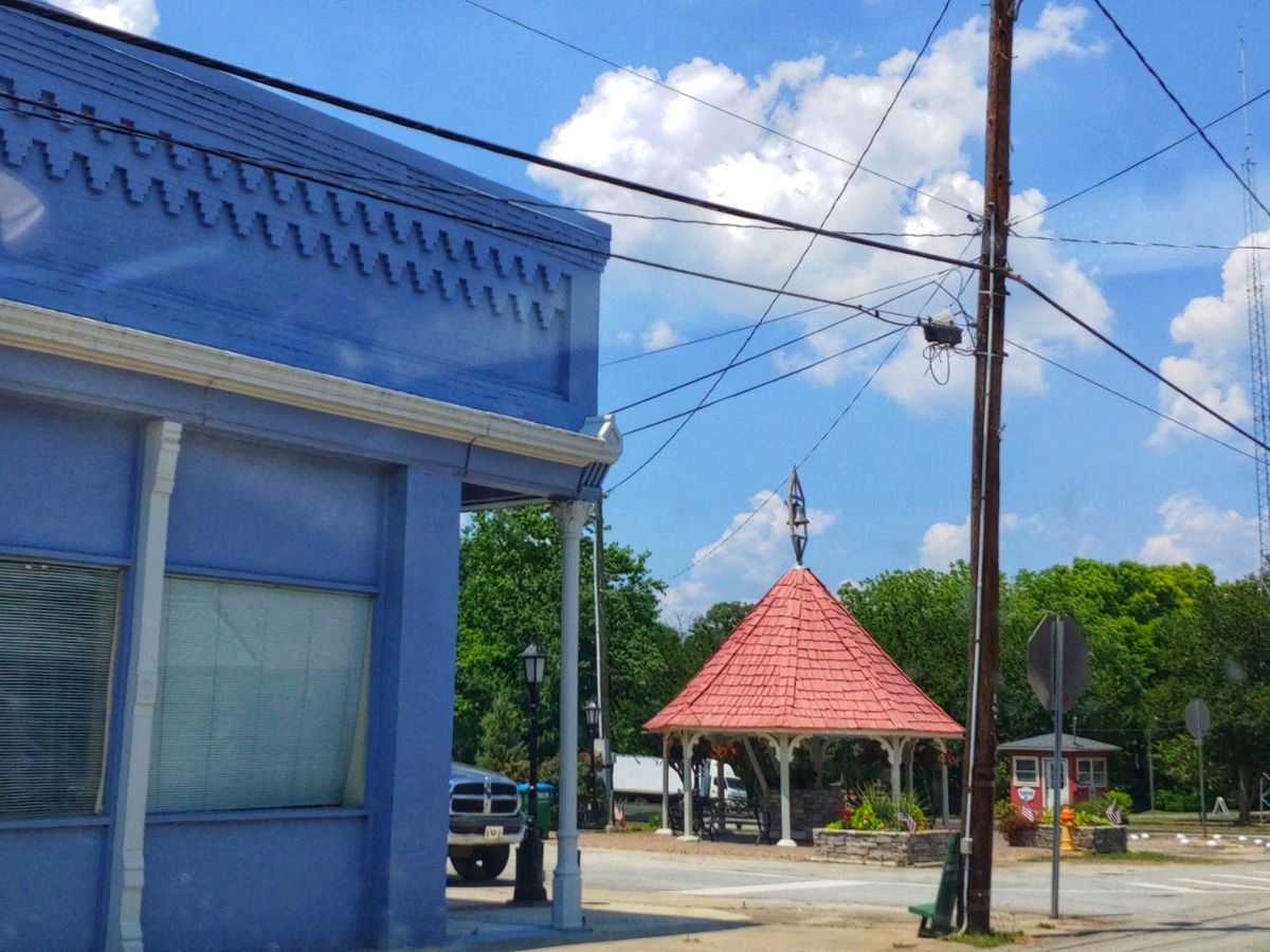 Bowman, Georgia's public square with its historic well house and storefront