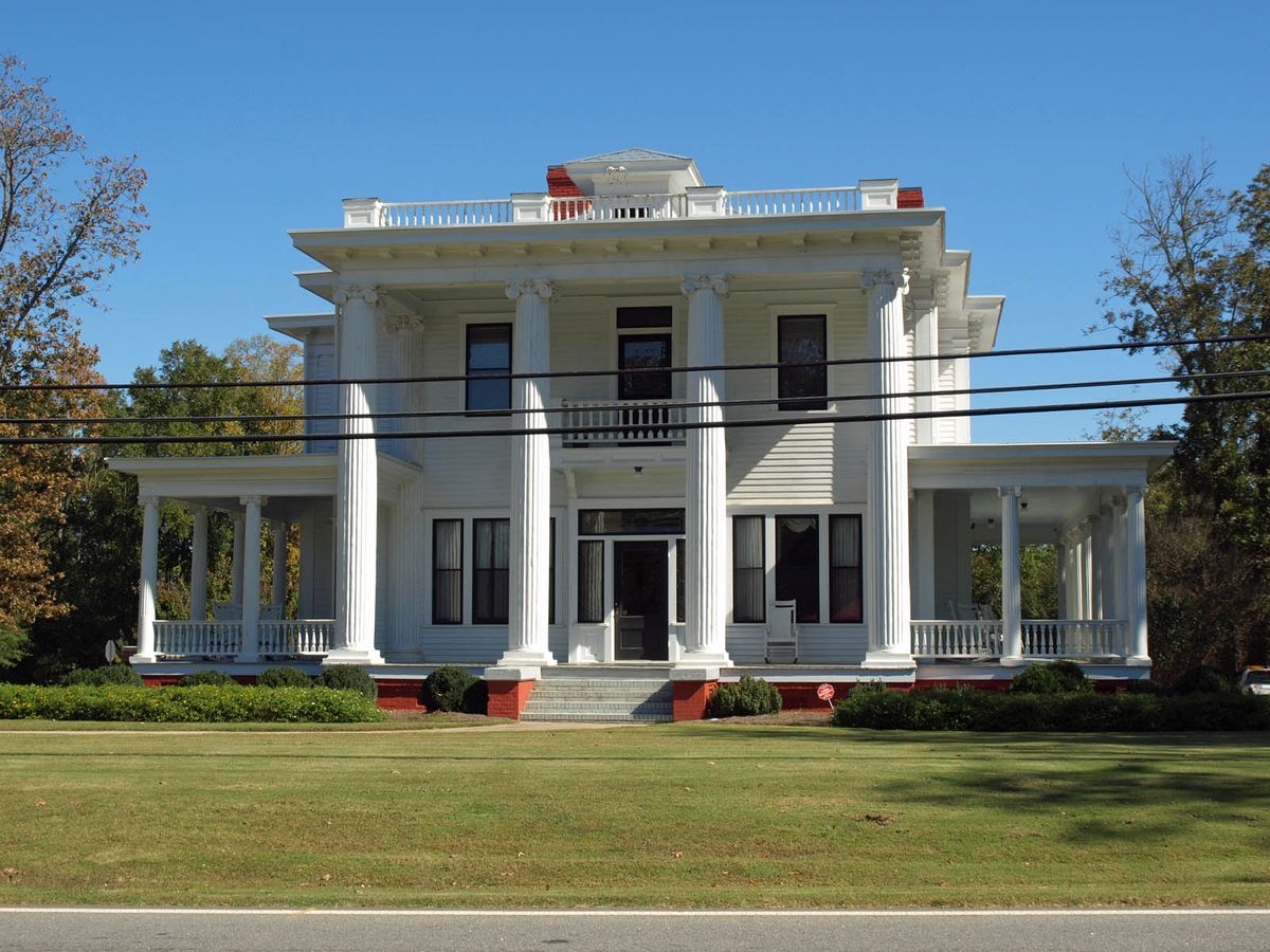 The white-columned W. H. Braselton House, now Braselton's town hall