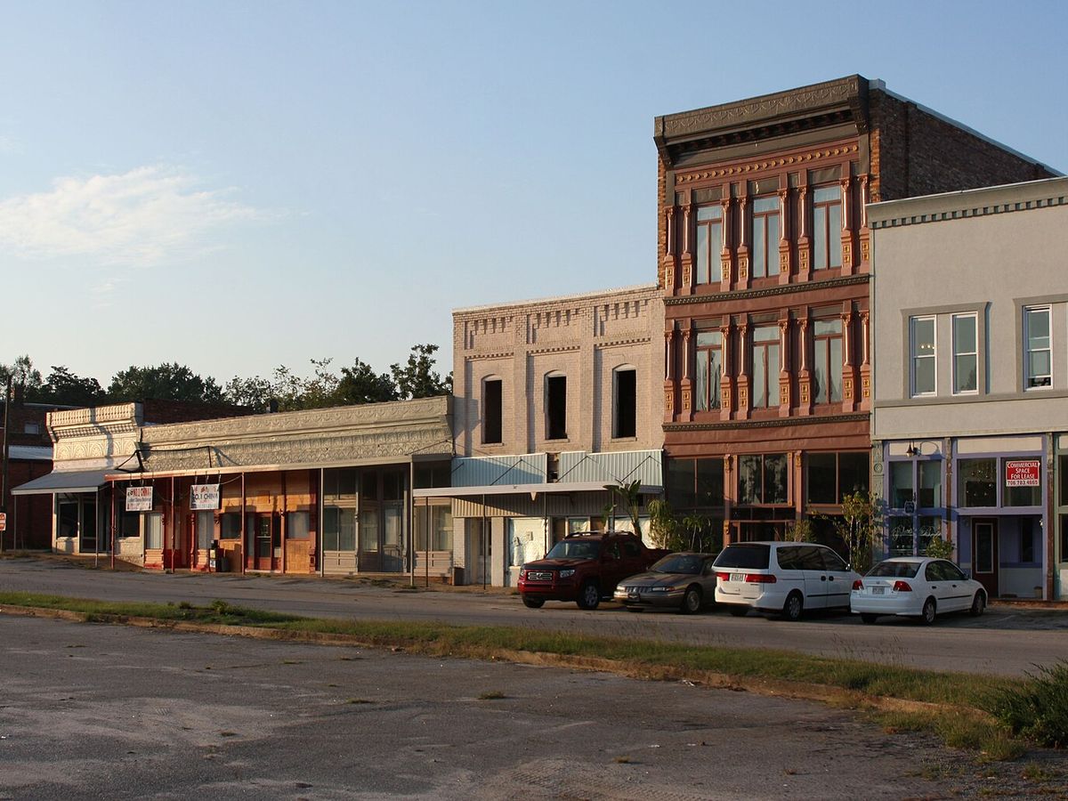 A row of historic two-story brick buildings in downtown Comer, Georgia