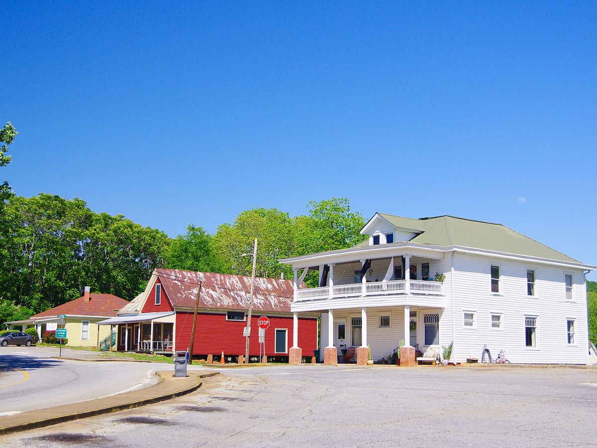 Historic wood-frame buildings along General Daniels Avenue in Danielsville, Georgia