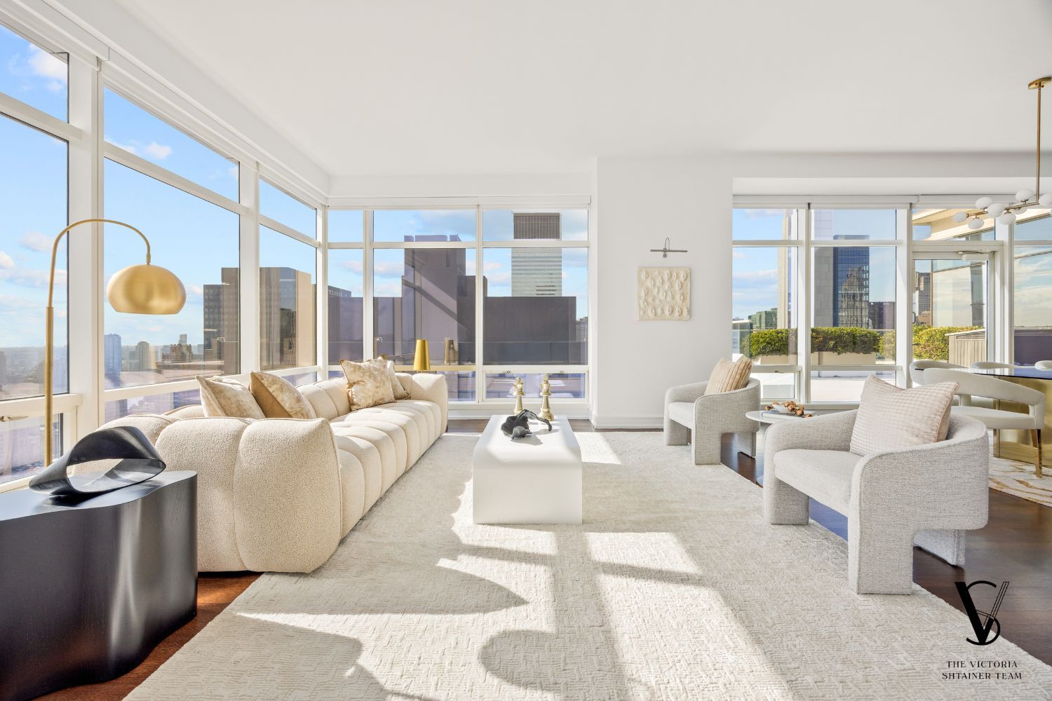 NYC luxury high-floor living room with floor-to-ceiling windows