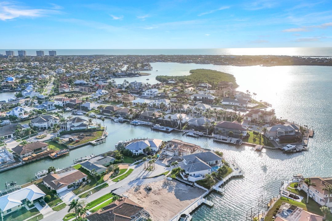 Aerial view of the waterfront neighborhood near 818 Elm Court, Marco Island