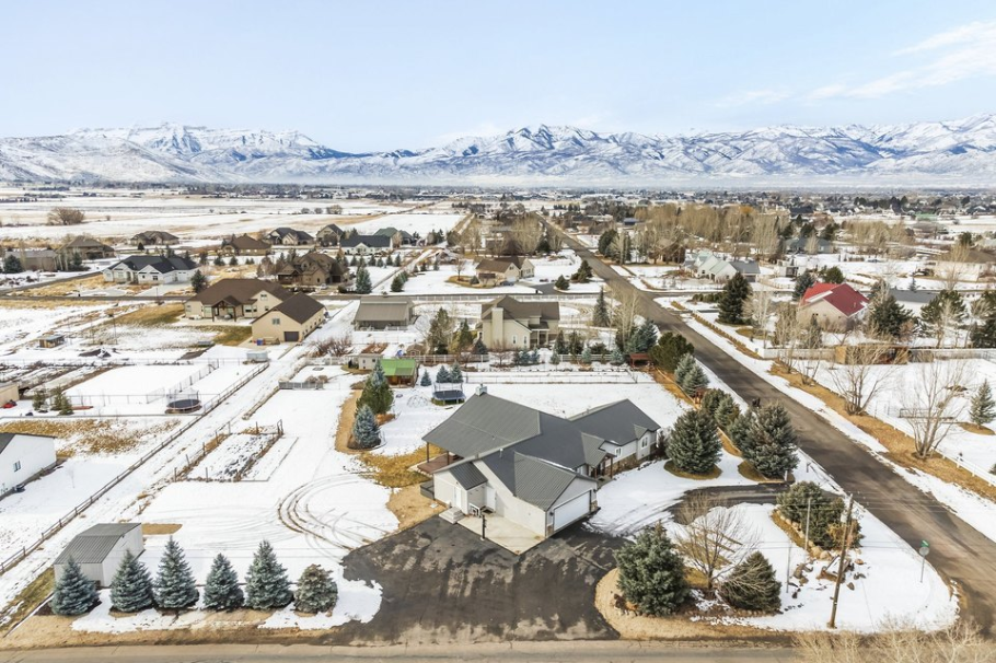 Charleston, Utah homes with spacious lots, mountain views, and a peaceful rural setting in winter.