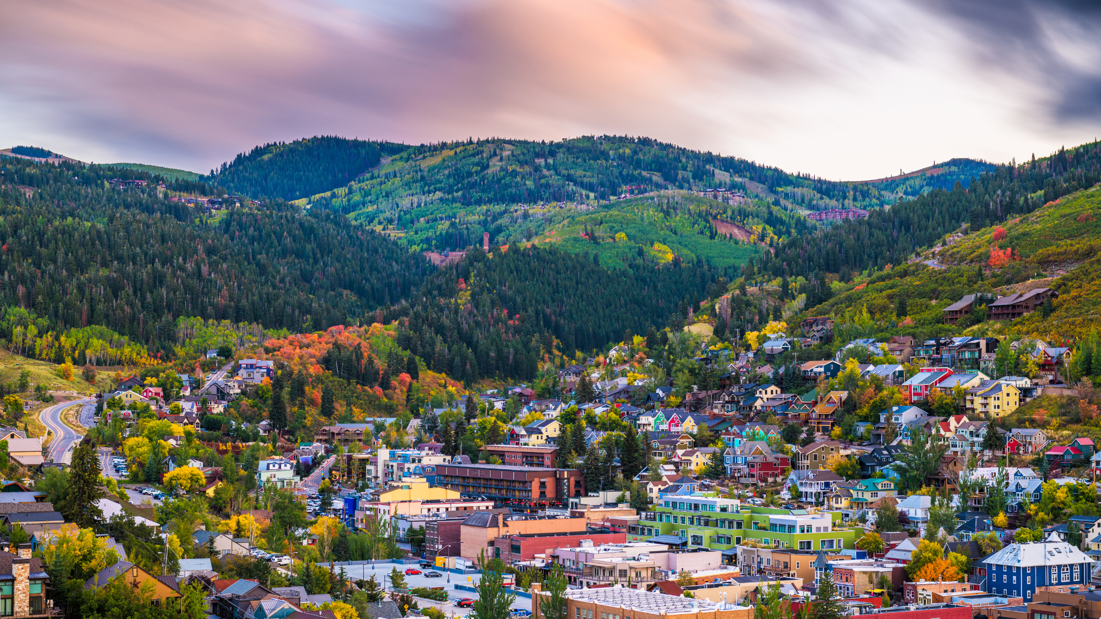 Park City residential neighborhood surrounded by golden fall aspens and mountain terrain in Utah