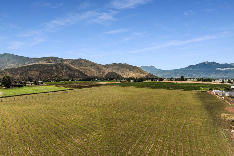 Open farmland in Daniel, Utah with mountain views and rural scenery.