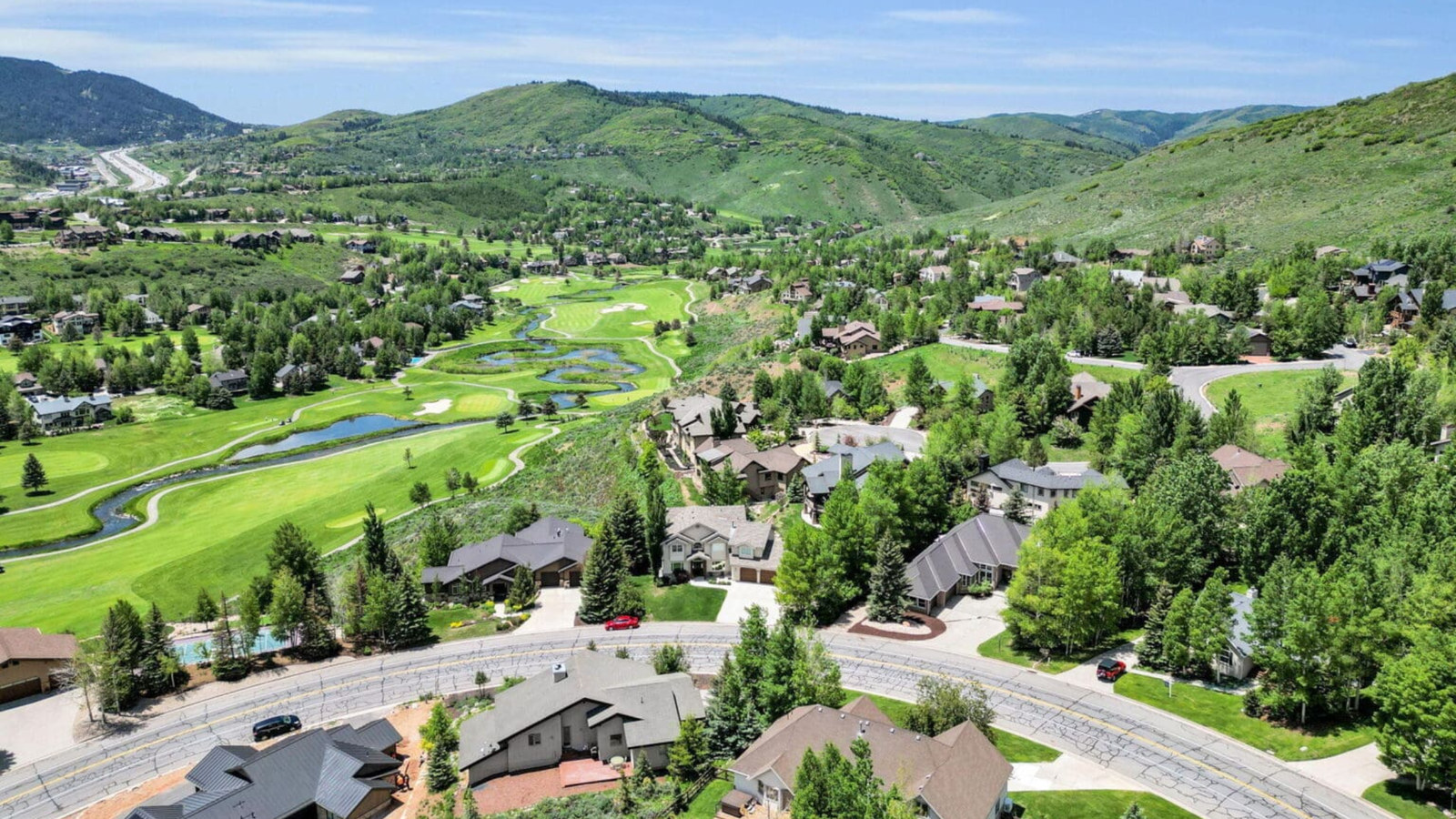 Golf course view homes and mountain landscapes in Jeremy Ranch, Park City Utah.