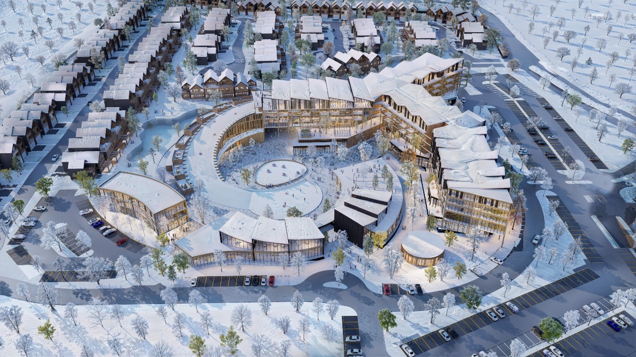 Aerial winter view of The Slope in Heber, showing villas, hotel buildings, the village core, and surrounding snowy landscape.